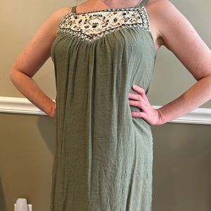 Adorable green flirty dress with embroidery and jewel embellishments